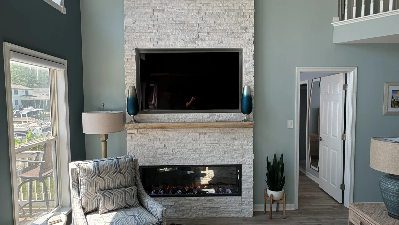 Fireplace Ocean View De Stone Surround Tall Ceiling 