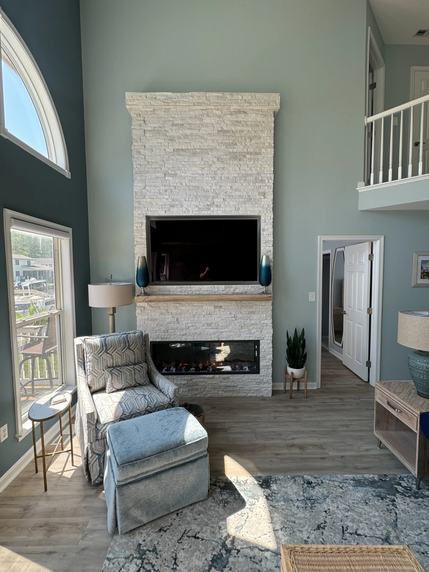 Fireplace Ocean View De Stone Surround Tall Ceiling