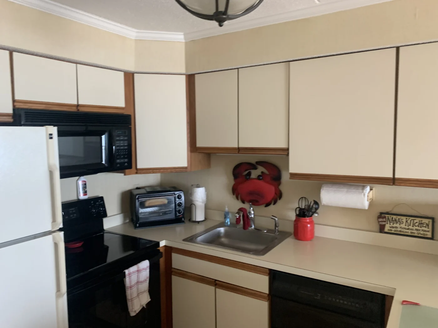 Kitchen Before Remodel Ocean City Md White Cabinets Slide In Range Fridge