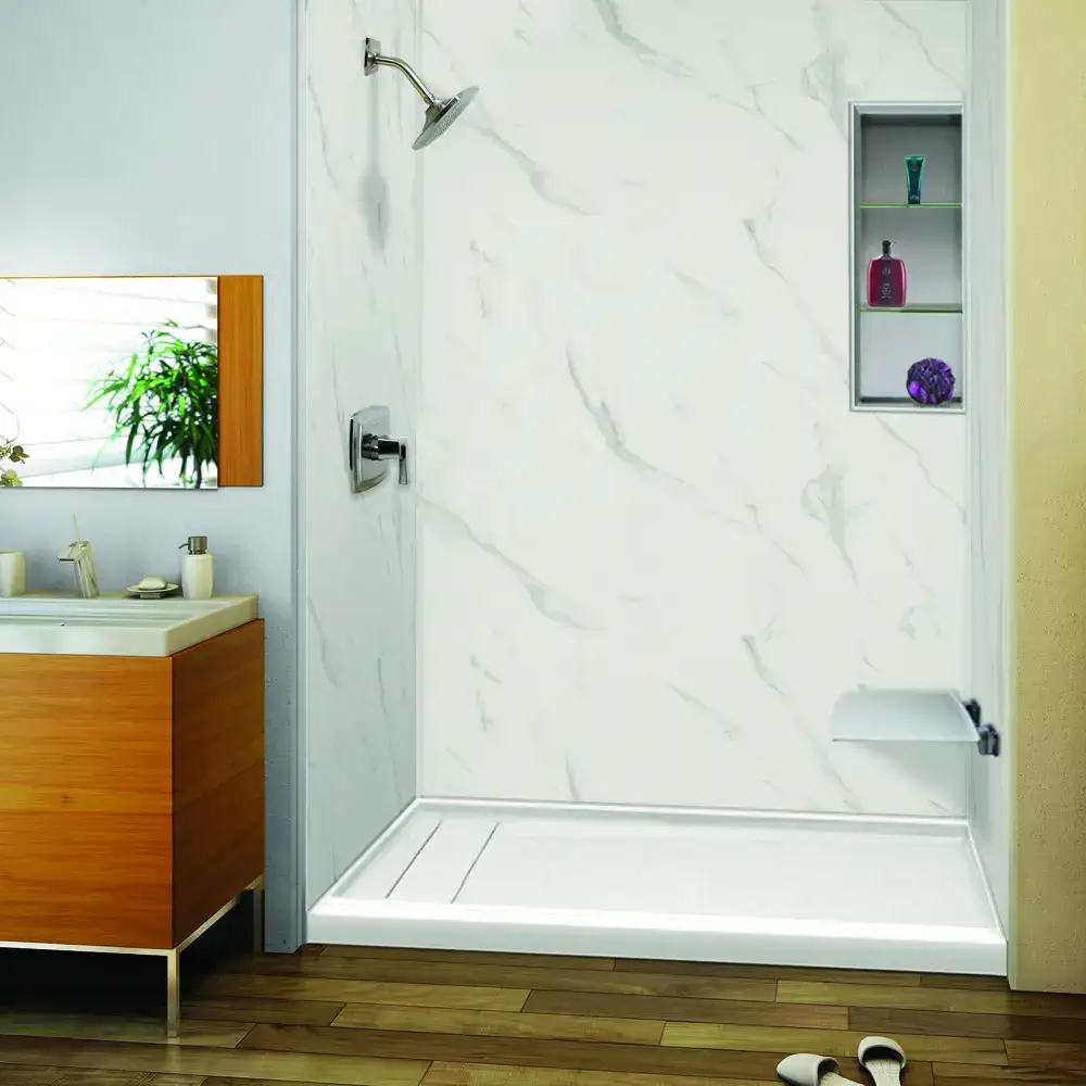 Birds-eye view of a brand new toilet and lovely bathroom sink.