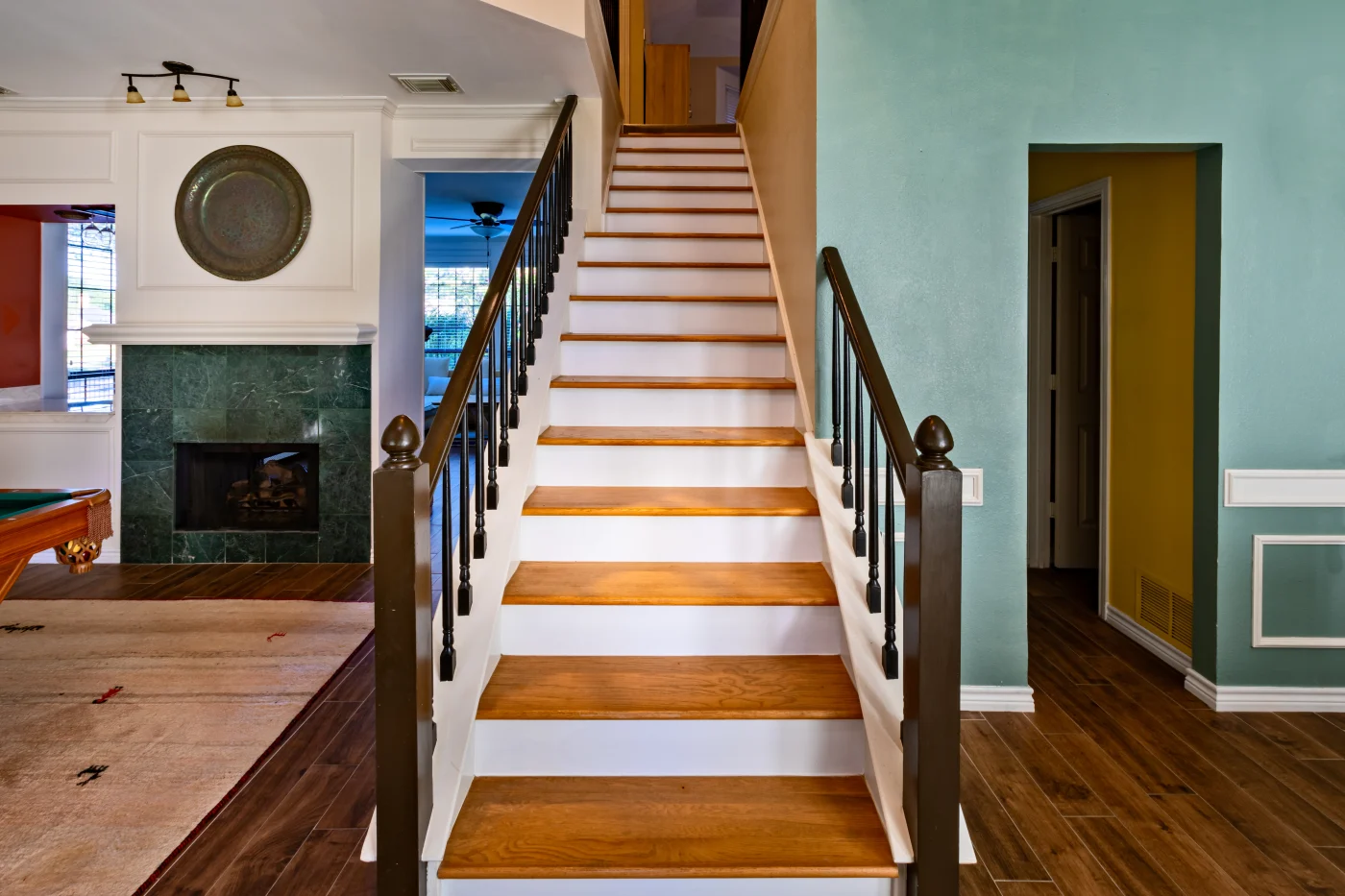 Remodeled stairs leading to the second floor of a house