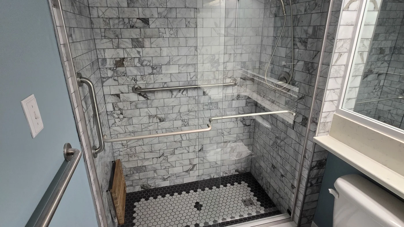 Exceptional Bath Remodeling Ocean City Shoreline Mast Contracting Close of a newly remodeled tile shower with bench installed by Mast Contracting