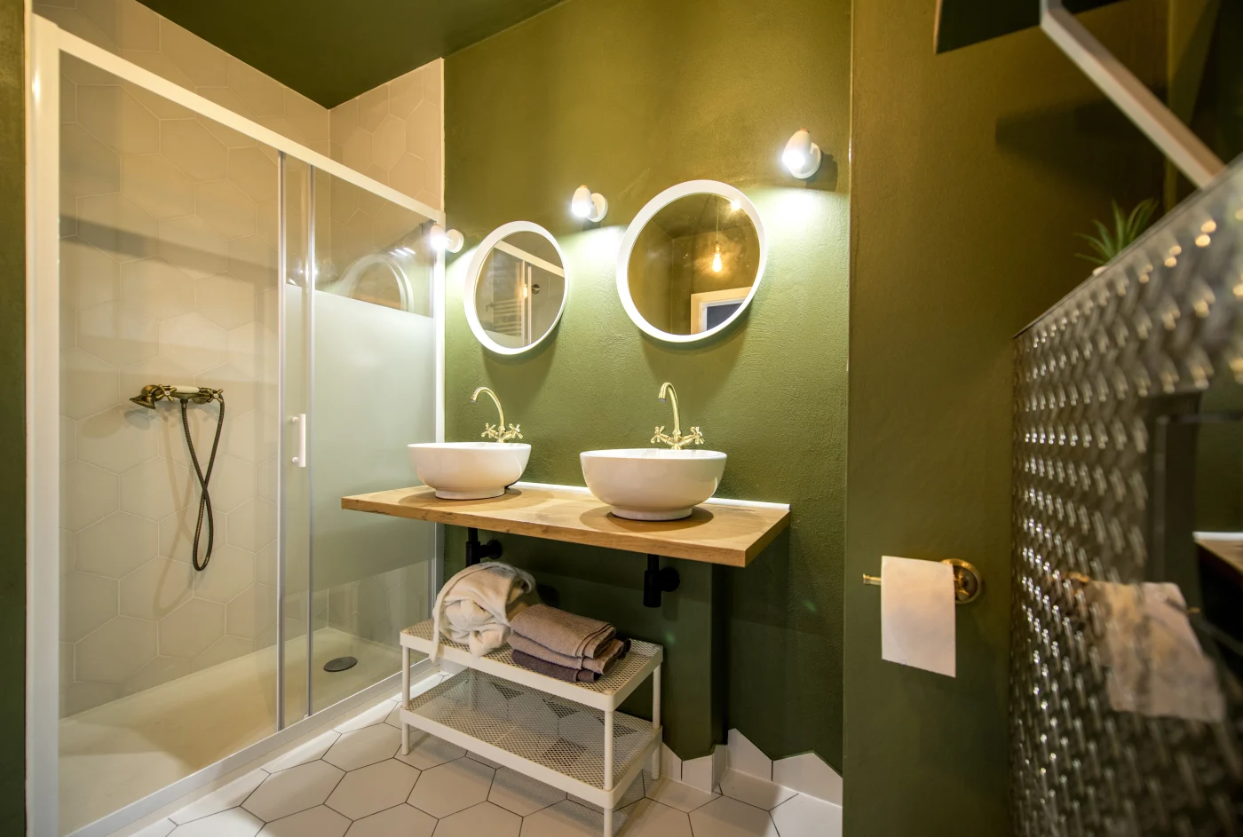 Speedy 5-Day Bath Remodel In Ocean Pines, MD | Mast Contracting Bathroom with sage green walls, white walk-in shower, and two sinks In Ocean Pines, MD | Mast Contracting